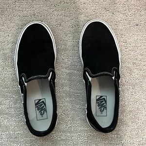 Vans classic slip on Black and white shoes. Woman’s size 9